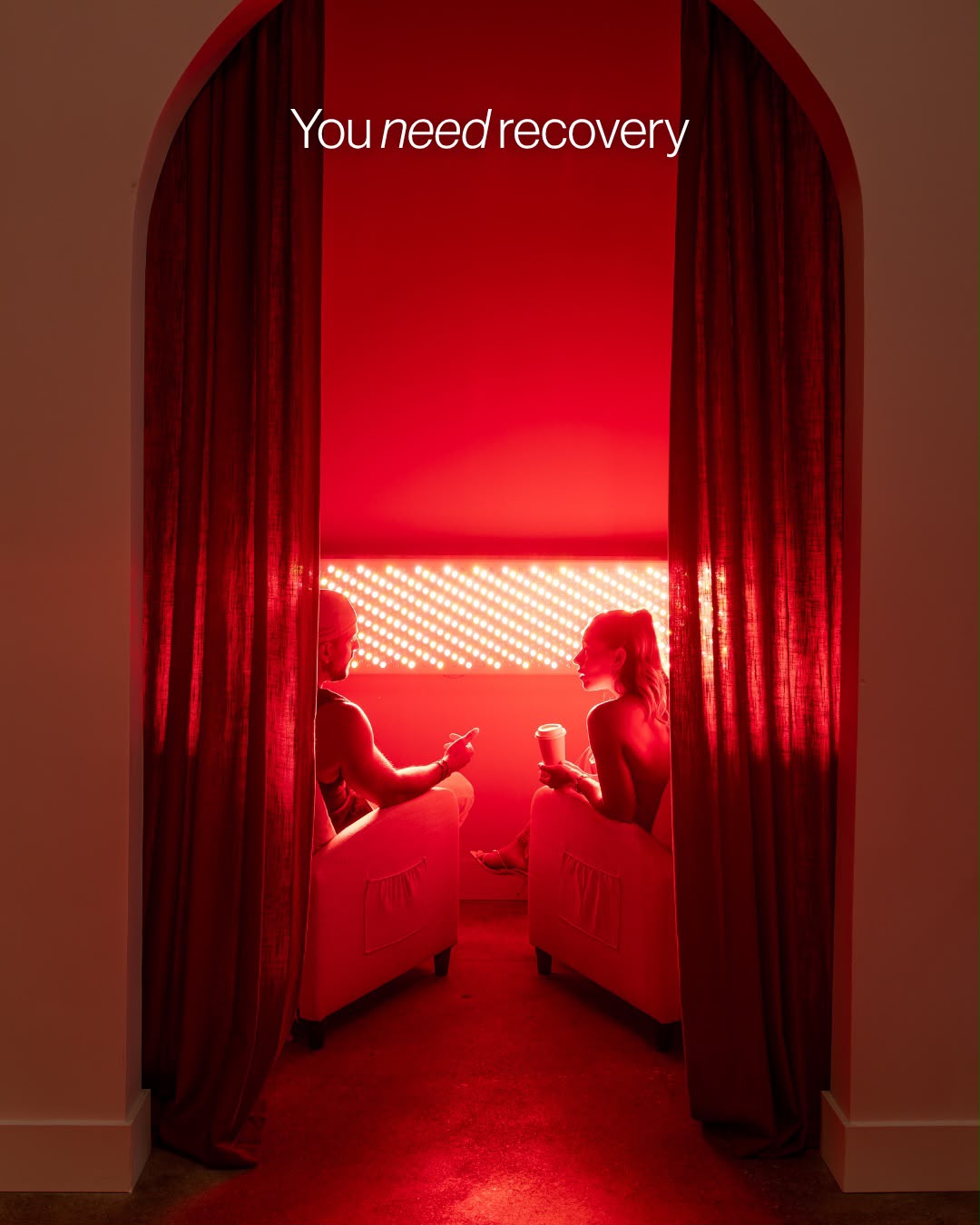 Two members in the red light room at CALMA